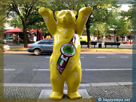 United Buddy Bear in Berlin sidewalk photo of United Buddy Bear in Berlin sidewalk