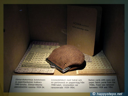 photo of ration cards with cases and paper fabric purse from the 1940s